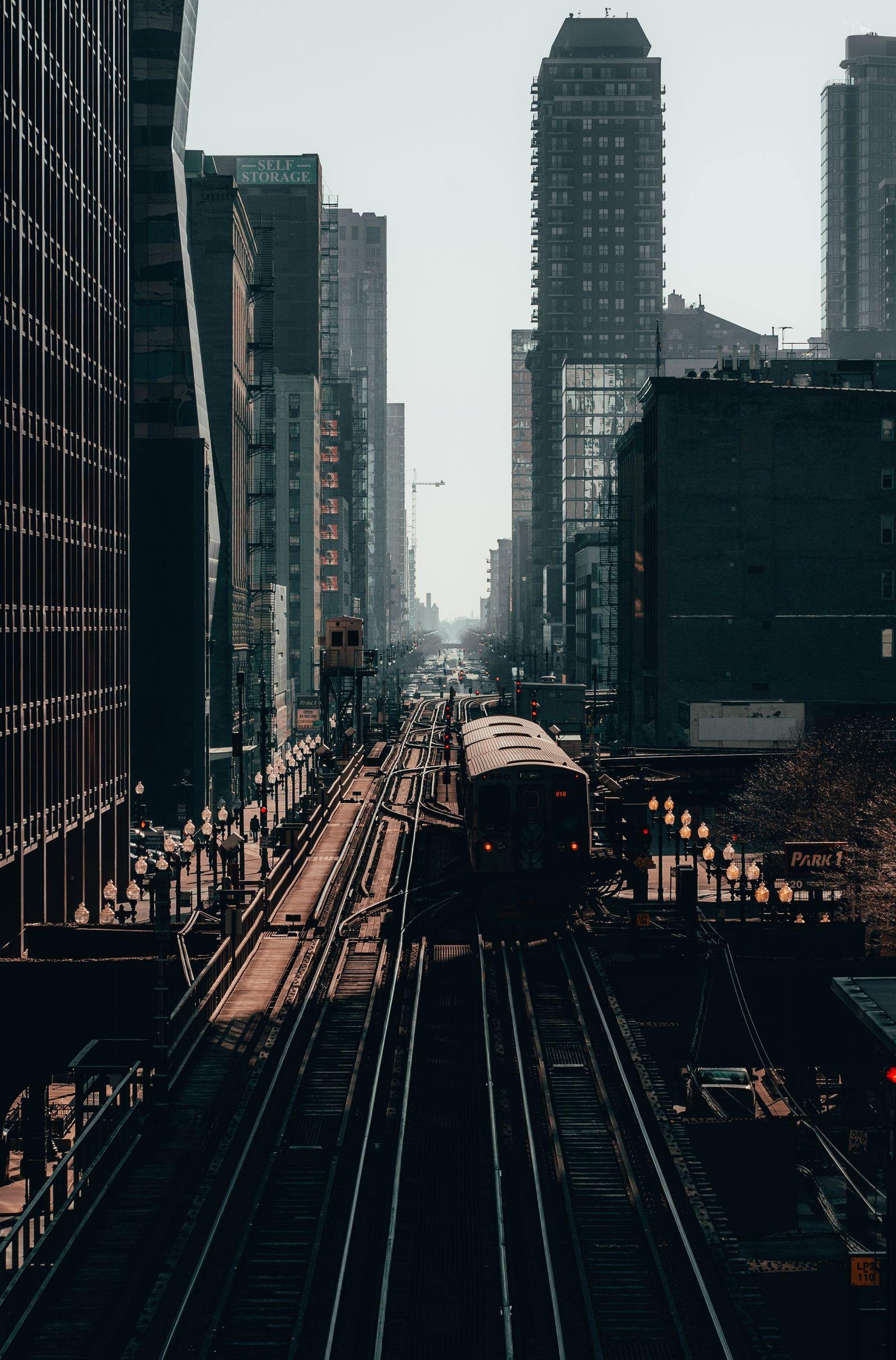 Chicago elevated train between downtown buildings